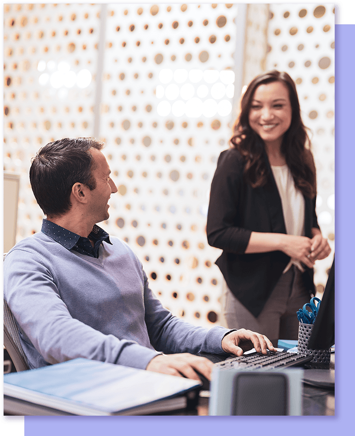Coworkers happily talking