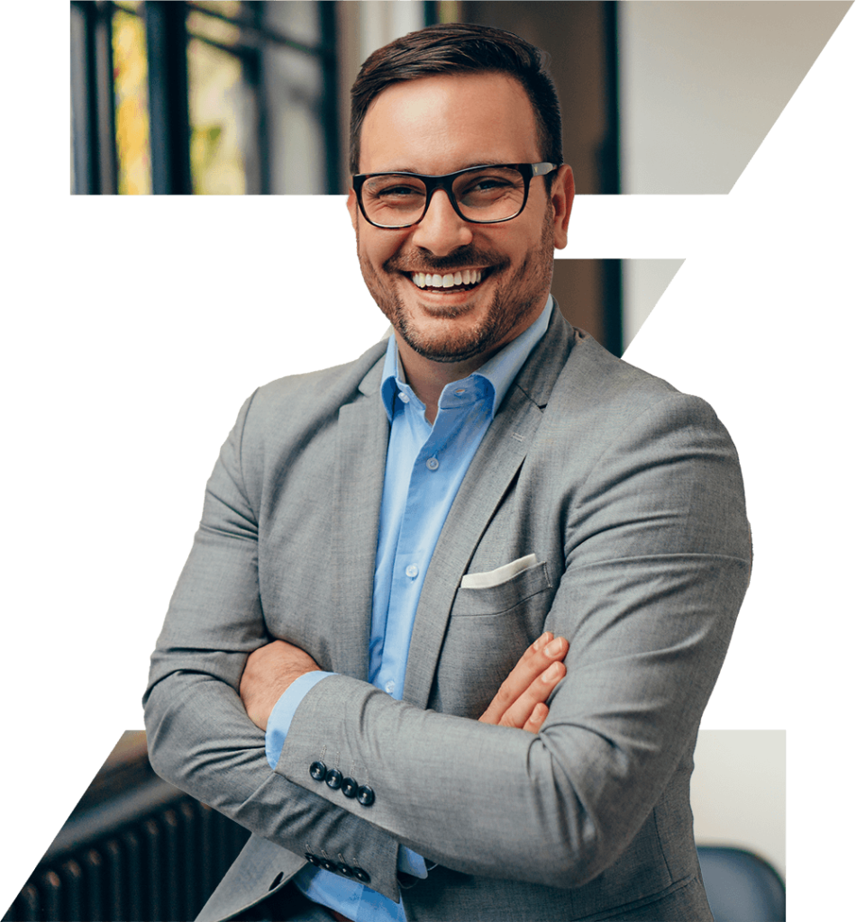 Man with arms crossed smiling
