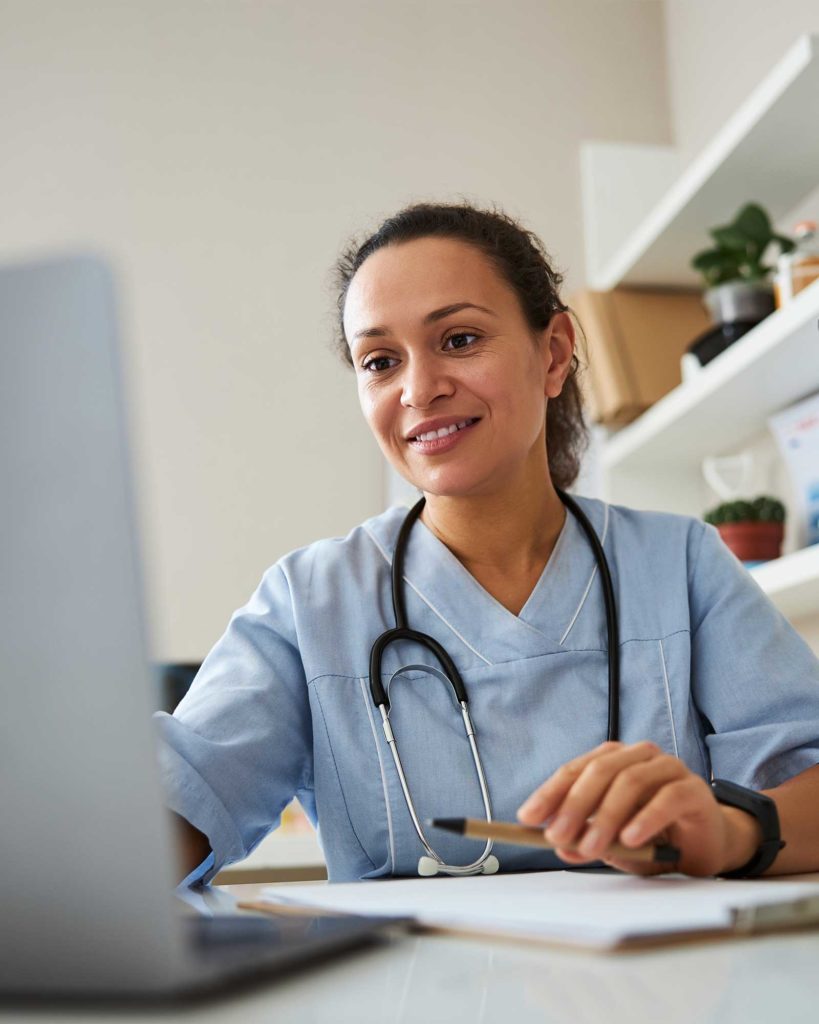 doctor looking at computer