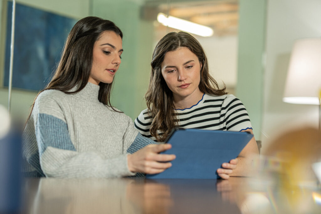 Women looking at screen