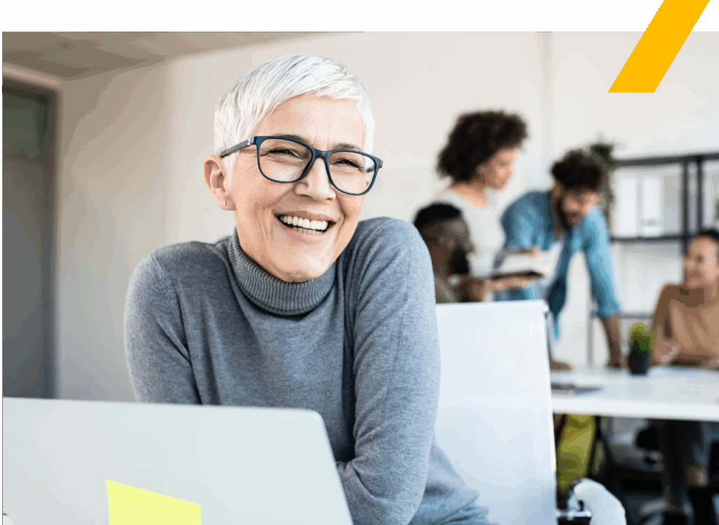 Women smiling looking away from screen: What are Alternative
Health Plans (AHPs)?